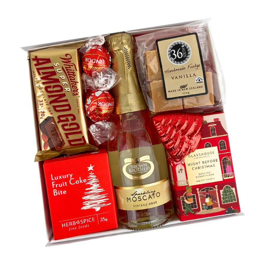 Pop the champagne with this Santa's red gift Christmas gift box | Glass house night before Christmas candle | Wine gift boxes | Sweet treat gift boxes nz | Celebration Box NZ wide delivery 
